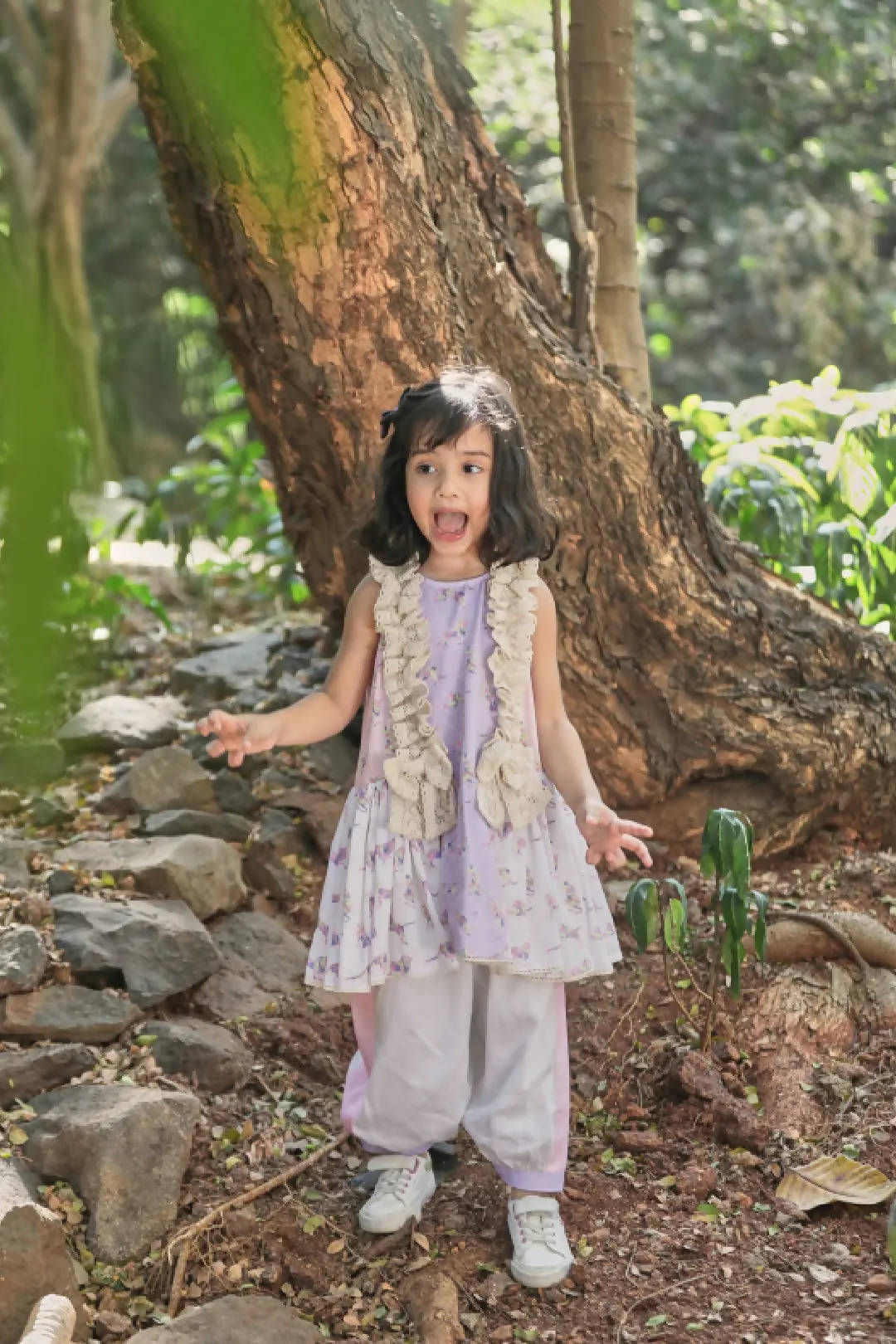 Off-white, pink, lavender animal print A-line kurta with frills & salwar set